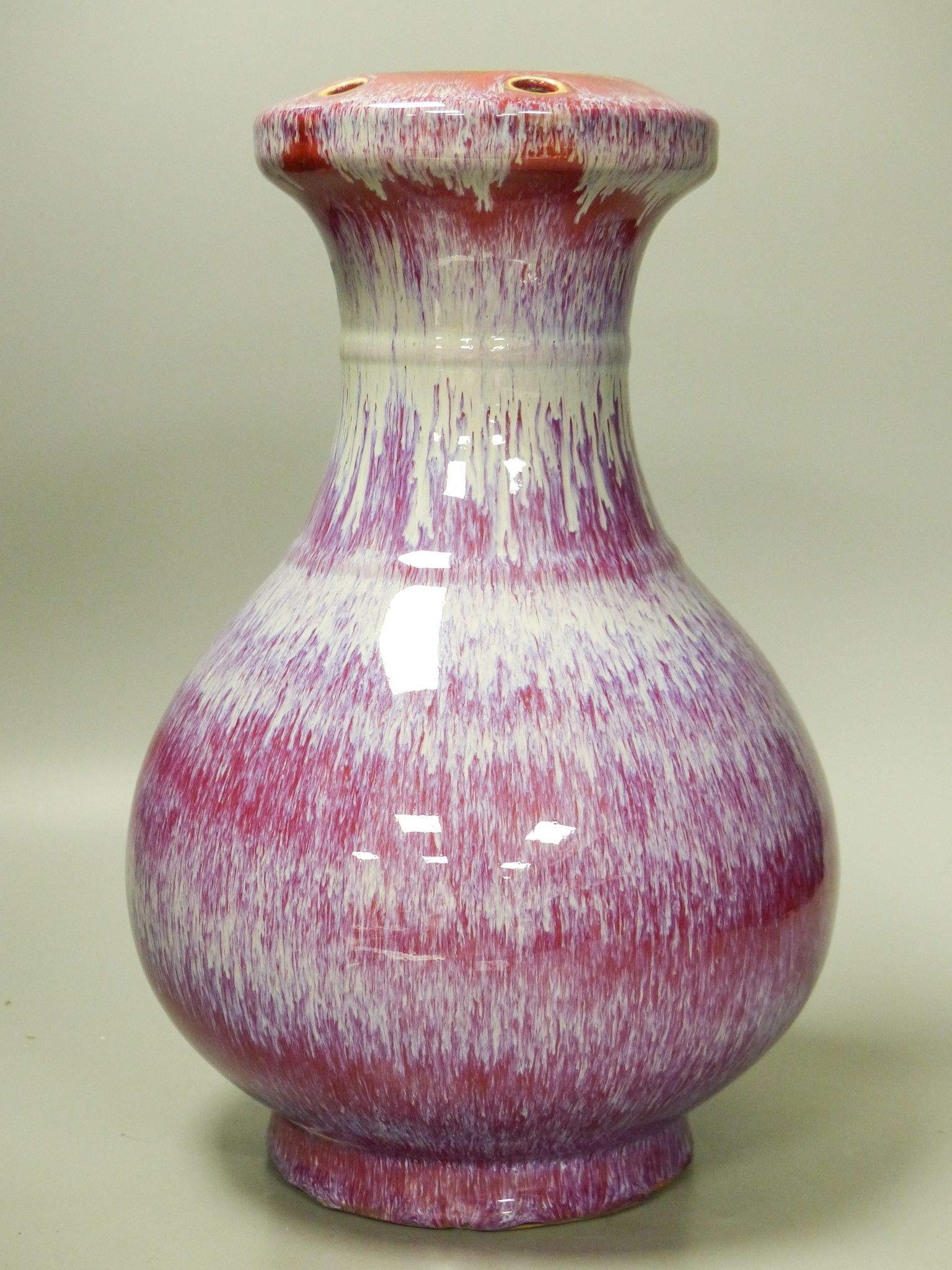 A Chinese crimson flambé glazed vase, 32cm